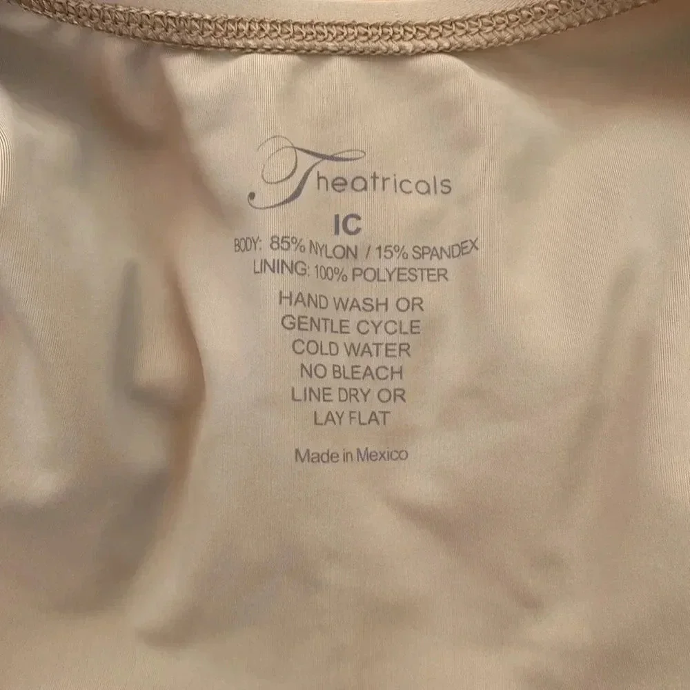 Theatricals long sleeve nude leotard hood pre owned condition no pilling sz IC